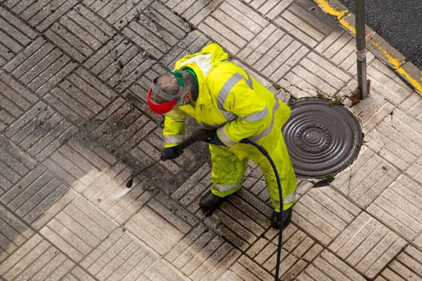 Photo of Man Pressure Cleaning