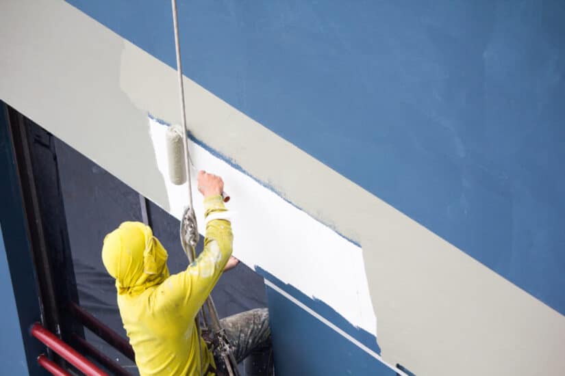 Commercial painter painting the house